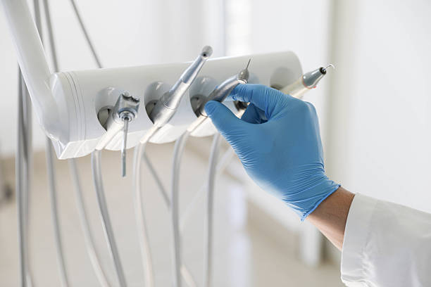Professional Tooth Extraction technician working in Latta, OK